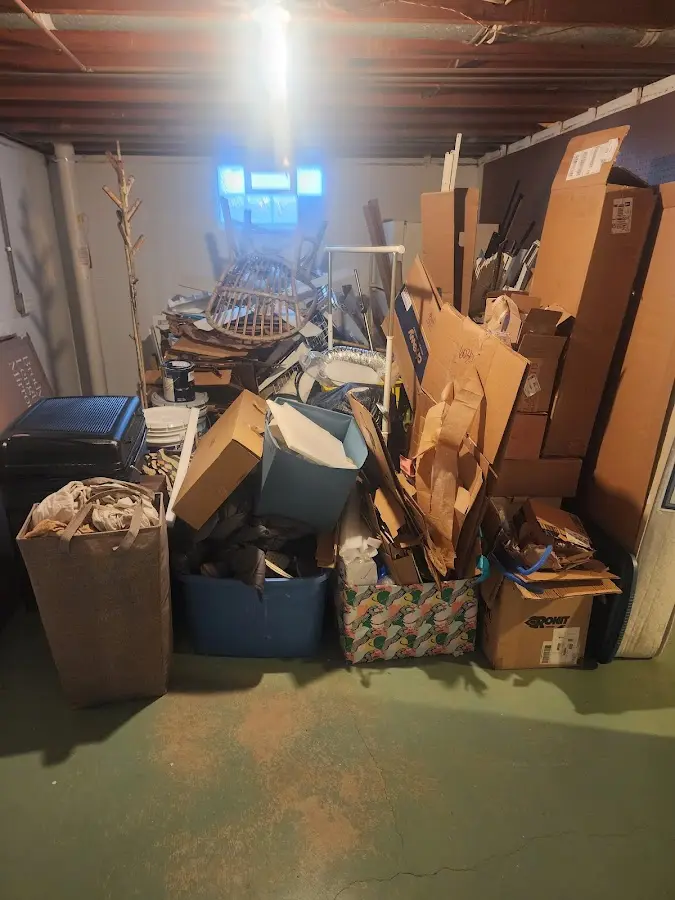 Roll-off dumpster container at job site for Concrete Dumpster Rental in Adams